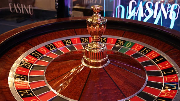 Mobile phone showing live blackjack tournament table